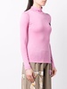 signature seal turtleneck top