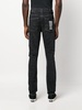 text-print mid-rise tapered jeans