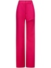 Asymmetric slit trousers