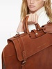 buckle-fastened leather garment bag