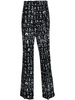 all-over graphic print trousers