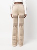 high-waisted knitted trousers