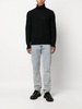 roll-neck cable-knit jumper