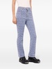 monogram-pattern flared jeans