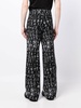 all-over graphic print trousers