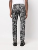 all-over graphic-print jeans