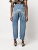 off-centre distressed denim trousers