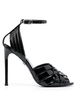 caged patent-leather pumps