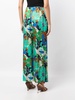 Alaia floral-print trousers