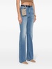 monogram-embroidered bootcut jeans