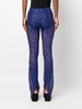 corded-lace flared trousers