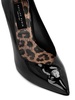 Skull-plaque high-heel pumps