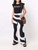 x Kenneth swirl-print trousers