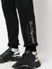 Hotel Karl logo-print track pants