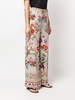 flared floral-print trousers