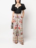 flared floral-print trousers