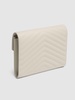 Cassandre embossed leather clutch