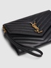 Monogram embossed leather clutch