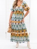 abstract printed midi dress in green and gold