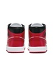 Nike Air Jordan 1 mid sneakers in black and red