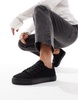 ASOS DESIGN Wide Fit Dizzy lace up sneakers in black drench