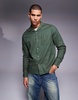 ASOS DESIGN relaxed revere shirt with back placement print in green