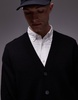 ARKET merino wool cardigan with v-neck and button front in black