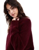 ASOS DESIGN crew neck oversized boucle sweater in burgundy