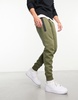 Nike Tech Fleece sweatpants in olive