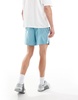 Nike Running Challenger Dri-FIT 5 inch shorts in light blue