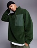 ASOS DESIGN oversized half zip fleece sweatshirt in dark green with chest pocket