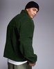 ASOS DESIGN oversized half zip fleece sweatshirt in dark green with chest pocket