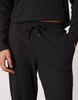 ASOS DESIGN ribbed straight leg sweatpants in washed black