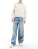 ASOS DESIGN super baggy jeans with rips in vintage light wash blue