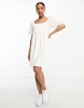 ASOS DESIGN eyelet mini smock dress with curve seam in white