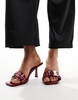 Simmi London Wide Fit Bexley mid heeled mules with grommet buckle detail in red