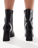 ASOS DESIGN Reach set back mid heel boots in black