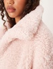 ASOS DESIGN longline curly borg coat in light pink