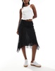 Mango asymmetric hem spot printed midi skirt in black