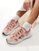 Nike Tech Hera sneakers in orange and pink