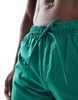 Cotton On stretch swim shorts in evergreen