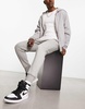 Nike Club cuffed sweatpants in gray