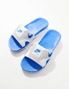 Nke Air Max 1 slides in white and blue