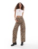 COLLUSION X002 baggy jeans in washed leopard print