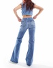 Tommy Jeans Sophie low rise belted jeans in mid wash