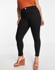 River Island Plus high rise skinny jeans in black