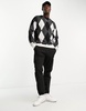 ADPT oversized argyle sweater in black