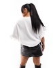 River Island Plus frill sleeve t-shirt in white