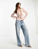 River Island embellished ruffle blouse in light pink