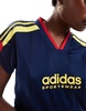 adidas Soccer Tiro crop T-shirt in navy blue with red and yellow stripes